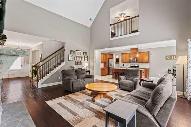 35 Huntington Way, Williamson, GA 30292 - living area with stairs, a ceiling fan, baseboards, and light wood-type flooring