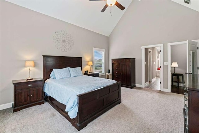35 Huntington Way, Williamson, GA 30292 - bedroom featuring connected bathroom, high vaulted ceiling, ceiling fan, baseboards, and light colored carpet