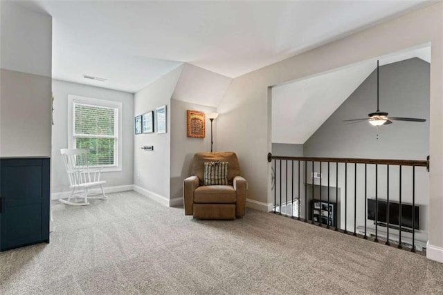 35 Huntington Way, Williamson, GA 30292 - sitting room with carpet, vaulted ceiling, ceiling fan, baseboards, and visible vents