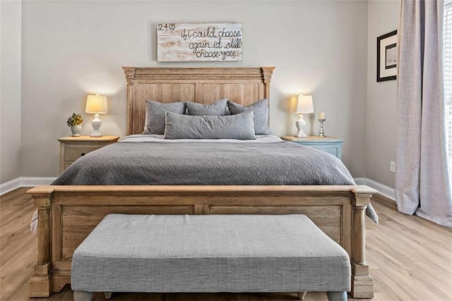 bedroom with light hardwood / wood-style floors