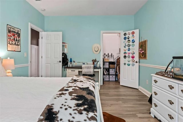 bedroom featuring hardwood / wood-style flooring