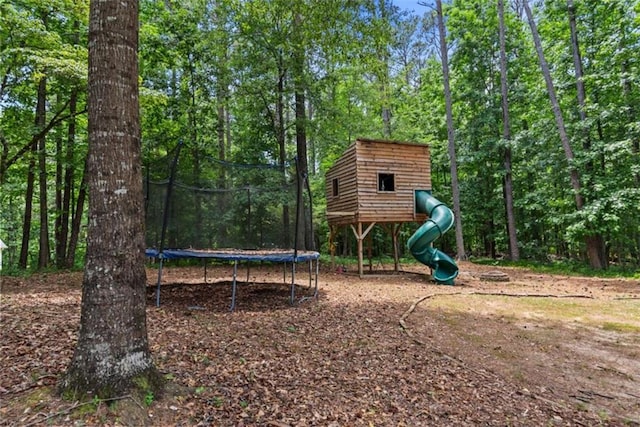 view of jungle gym with a trampoline