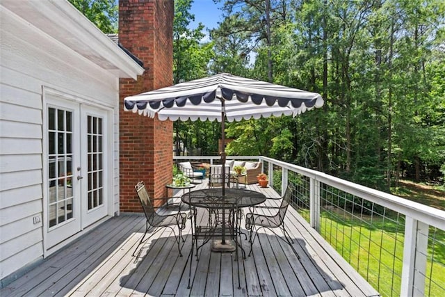 wooden terrace featuring french doors