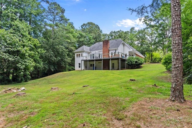 view of yard featuring a wooden deck