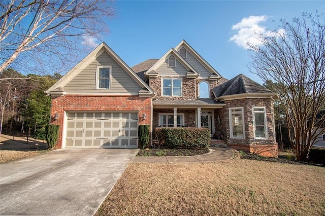 craftsman-style home with a garage and a front lawn