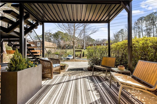 view of patio featuring stairway