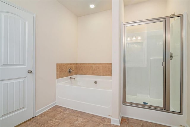 bathroom with independent shower and bath