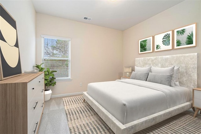 bedroom featuring light carpet