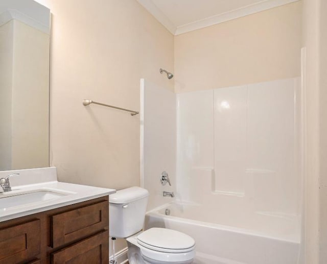 full bathroom featuring vanity, crown molding, toilet, and washtub / shower combination