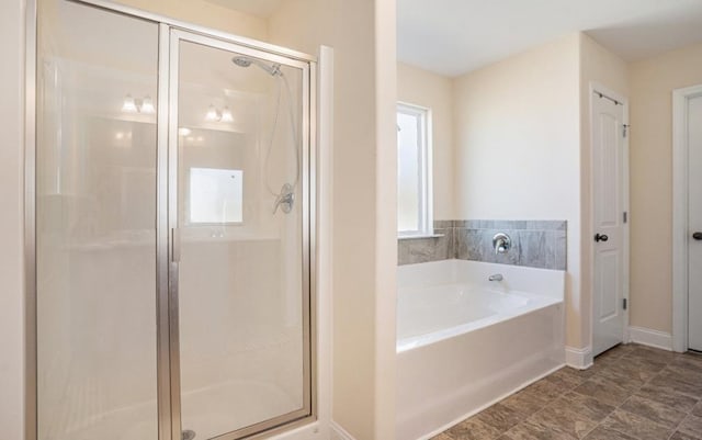 bathroom with independent shower and bath