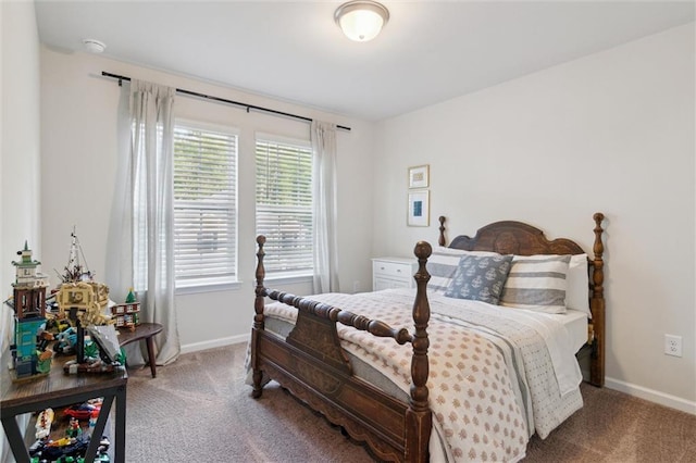 carpeted bedroom with baseboards