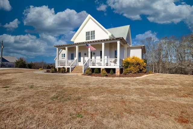 view of front of house featuring a porch and a front lawn