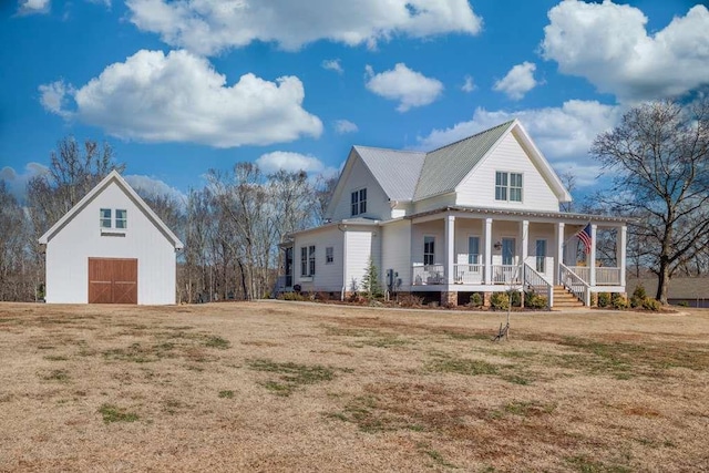 view of front of property featuring a front lawn and covered porch