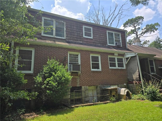 1526 Snapfinger Rd, Decatur, GA 30032 - rear view of property with brick siding, a lawn, cooling unit, and a shingled roof