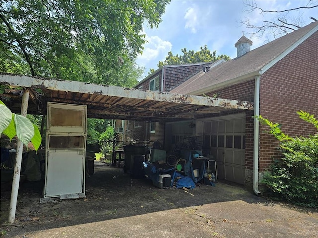 1526 Snapfinger Rd, Decatur, GA 30032 - view of car parking featuring a carport, a garage, and driveway