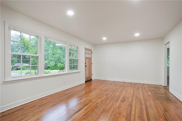 3480 Mount Olive Rd, Atlanta, GA 30344 - spare room with baseboards, light wood finished floors, and recessed lighting