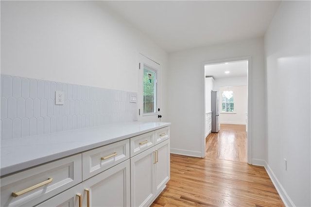 3480 Mount Olive Rd, Atlanta, GA 30344 - hall featuring light wood-style flooring and baseboards