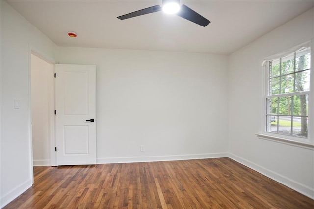 3480 Mount Olive Rd, Atlanta, GA 30344 - unfurnished room featuring a ceiling fan, wood finished floors, and baseboards