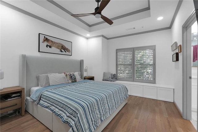 208 Wade Creek Rd, Alpharetta, GA 30009 - bedroom with a raised ceiling, wood finished floors, ornamental molding, recessed lighting, and ceiling fan