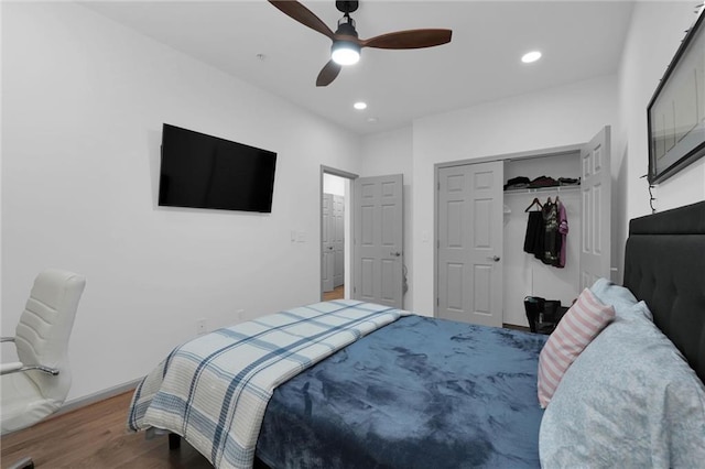 208 Wade Creek Rd, Alpharetta, GA 30009 - bedroom with wood finished floors, recessed lighting, a ceiling fan, and a closet