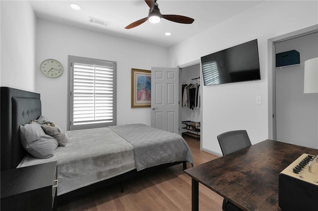 208 Wade Creek Rd, Alpharetta, GA 30009 - bedroom with wood finished floors, ceiling fan, and recessed lighting
