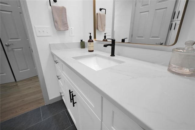 208 Wade Creek Rd, Alpharetta, GA 30009 - bathroom featuring vanity, tile patterned floors, and baseboards