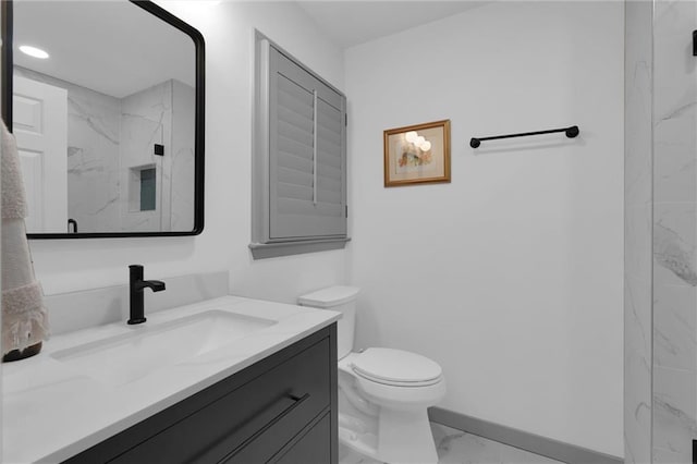 208 Wade Creek Rd, Alpharetta, GA 30009 - full bath featuring marble look tiles, toilet, vanity, and a marble finish shower