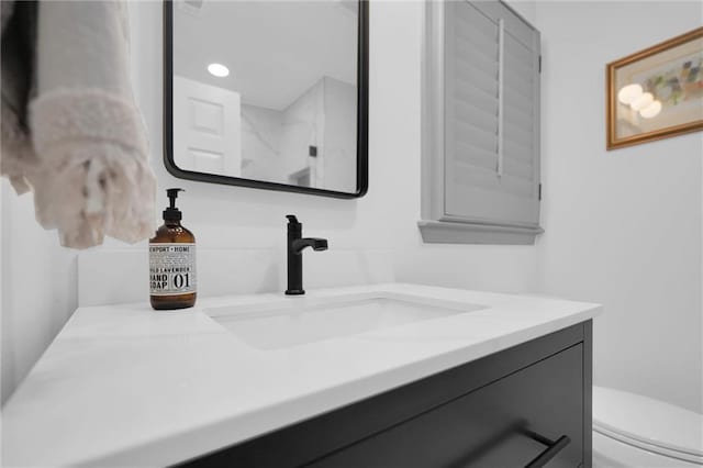 208 Wade Creek Rd, Alpharetta, GA 30009 - bathroom featuring vanity and toilet