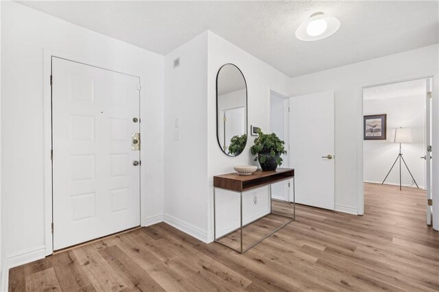 bedroom with dark hardwood / wood-style floors and ceiling fan