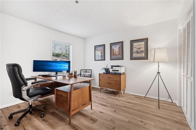 bedroom with dark hardwood / wood-style floors and ceiling fan