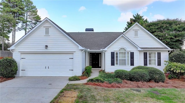 ranch-style house featuring a garage