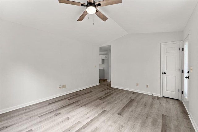 60 Weeping Willow Ln, Dawsonville, GA 30534 - empty room with ceiling fan, wood finished floors, lofted ceiling, and baseboards