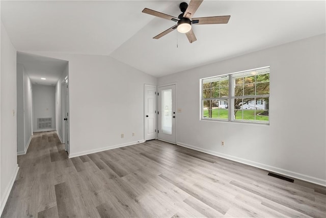 60 Weeping Willow Ln, Dawsonville, GA 30534 - empty room featuring vaulted ceiling, wood finished floors, a ceiling fan, and baseboards