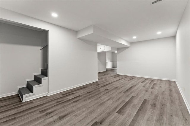 60 Weeping Willow Ln, Dawsonville, GA 30534 - finished basement with wood finished floors, baseboards, stairs, and recessed lighting