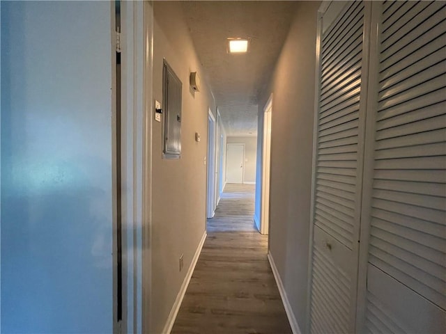 33 Drew Ct, Jonesboro, GA 30238 - corridor featuring wood finished floors and electric panel