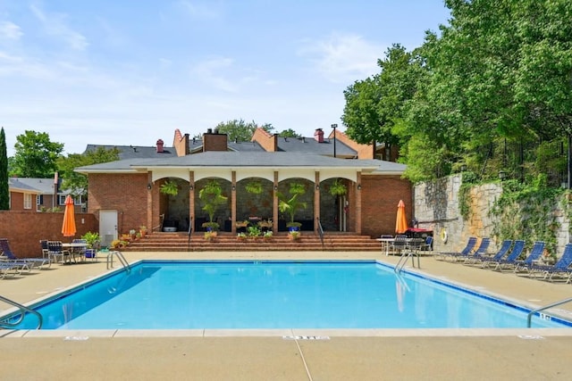 view of pool with a patio