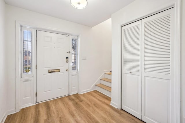 entrance foyer with light hardwood / wood-style floors