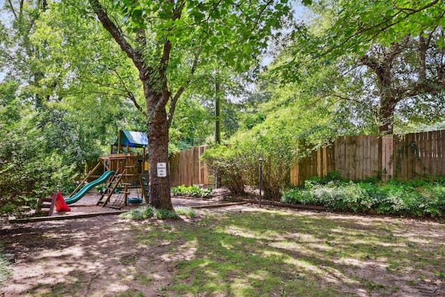 view of yard with a playground