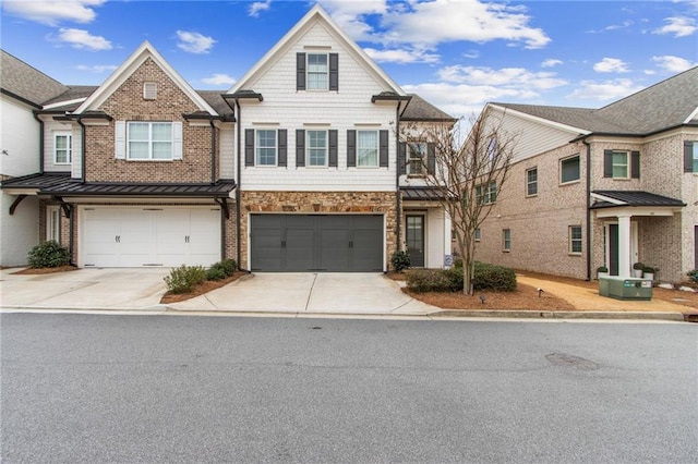 multi unit property featuring a garage