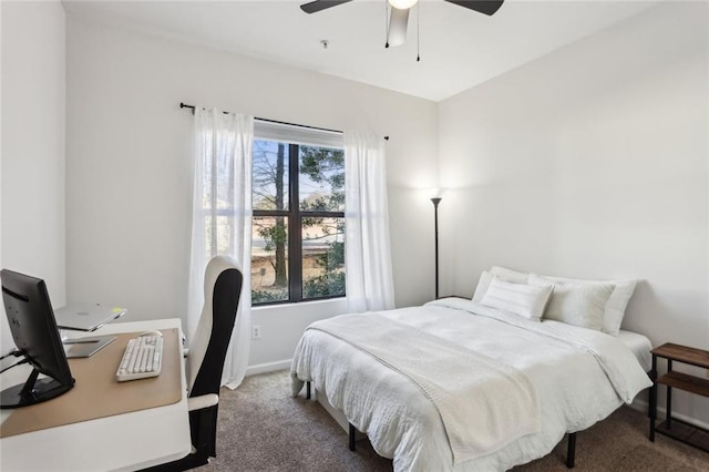 bedroom featuring carpet flooring, a ceiling fan, and baseboards