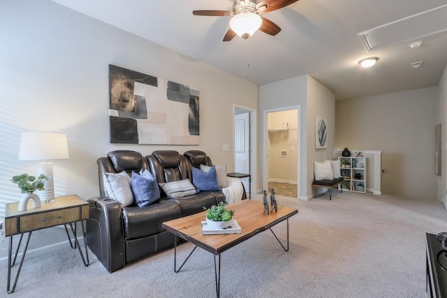 living room featuring light carpet and ceiling fan