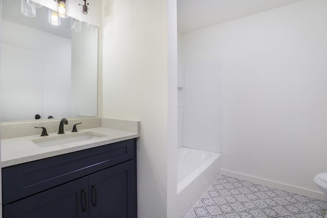 full bath featuring toilet, baseboards, and vanity