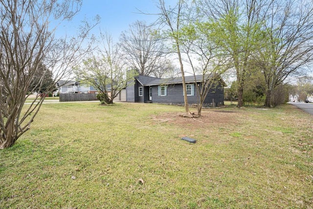 view of yard with fence