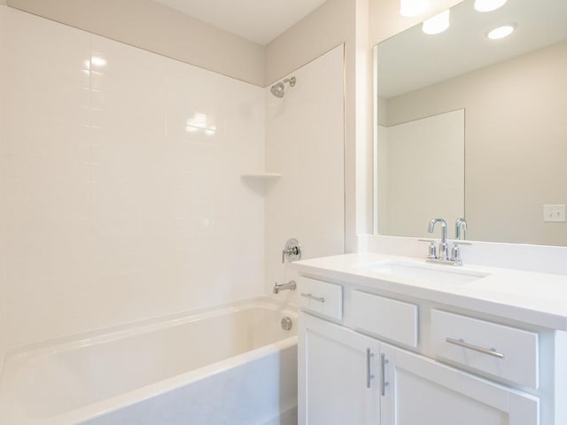 bathroom featuring vanity and shower / washtub combination