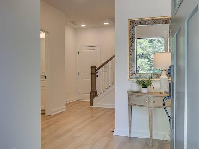 entrance foyer featuring light hardwood / wood-style flooring