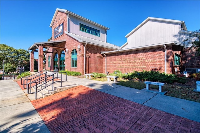 view of property's community with a patio