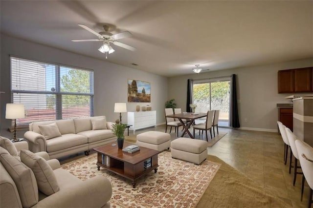 living room featuring ceiling fan