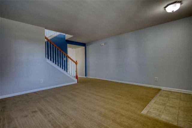 unfurnished living room featuring carpet floors