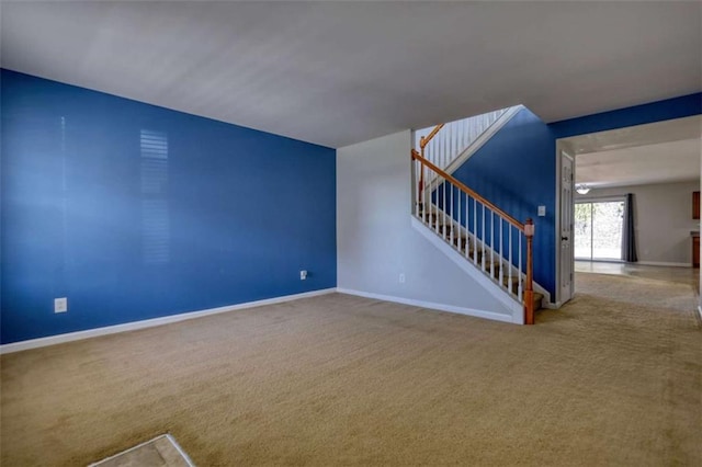 unfurnished living room with carpet floors