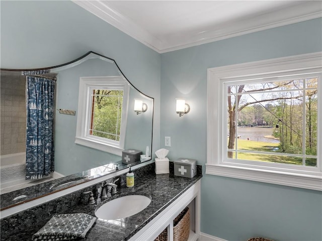 bathroom featuring vanity, ornamental molding, a water view, and a shower with shower curtain